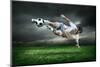 Football Player with Ball in Action Outdoors-Andrey Yurlov-Mounted Photographic Print