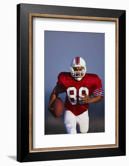 Football Player-DLILLC-Framed Photographic Print