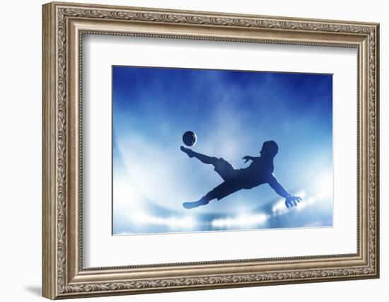 Football, Soccer Match. A Player Shooting on Goal Performing a Bicycle Kick. Lights on the Stadium-Michal Bednarek-Framed Photographic Print