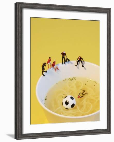 Footballers Looking for Ball in Noodle Soup Pond-Martina Schindler-Framed Photographic Print