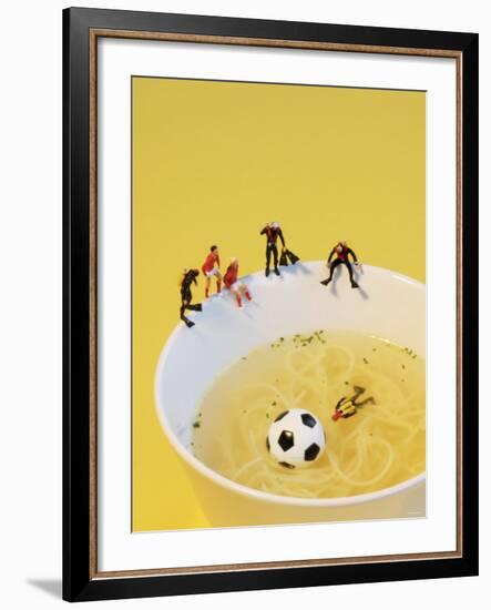 Footballers Looking for Ball in Noodle Soup Pond-Martina Schindler-Framed Photographic Print