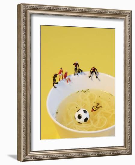 Footballers Looking for Ball in Noodle Soup Pond-Martina Schindler-Framed Photographic Print