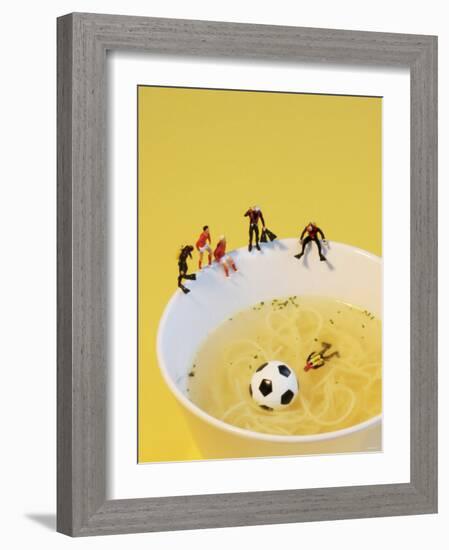 Footballers Looking for Ball in Noodle Soup Pond-Martina Schindler-Framed Photographic Print