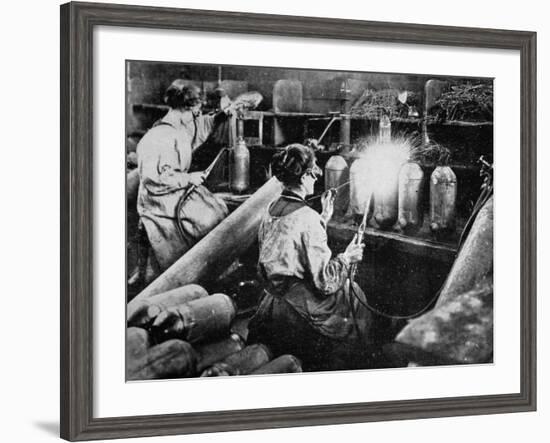 For General Petain's Guns, French Women Finishing Shell Cases, from 'The Illustrated War News'-null-Framed Giclee Print