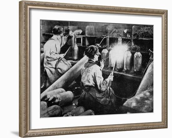 For General Petain's Guns, French Women Finishing Shell Cases, from 'The Illustrated War News'-null-Framed Giclee Print