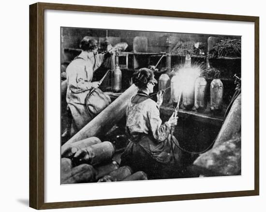 For General Petain's Guns, French Women Finishing Shell Cases, from 'The Illustrated War News'-null-Framed Giclee Print