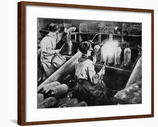 For General Petain's Guns, French Women Finishing Shell Cases, from 'The Illustrated War News'-null-Framed Giclee Print
