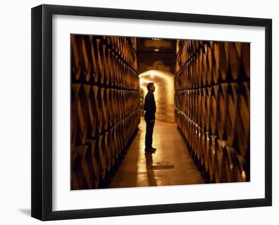 Foreman of Works Inspects Barrels of Rioja Wine in the Underground Cellars at Muga Winery-John Warburton-lee-Framed Photographic Print