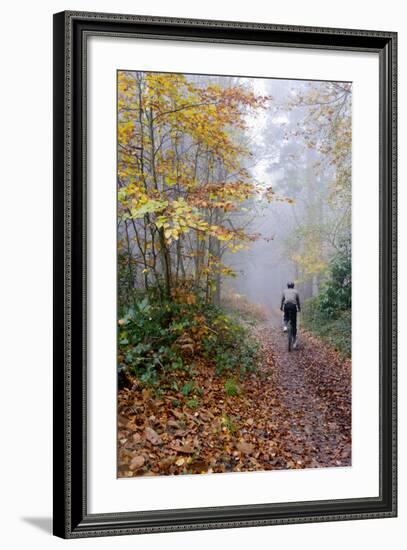 Forest cycling-Charles Bowman-Framed Photographic Print