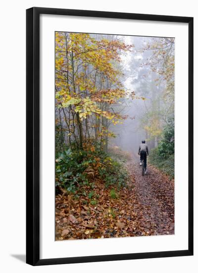 Forest cycling-Charles Bowman-Framed Photographic Print