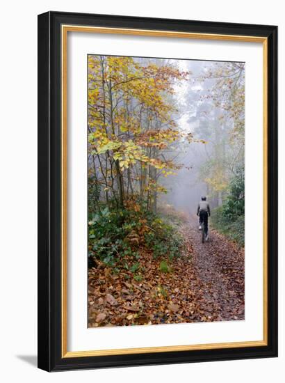 Forest cycling-Charles Bowman-Framed Photographic Print