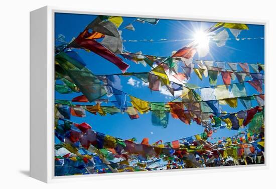 Forest' of Prayer Flags Backlit Against the Sun at the Top of Khardung La Pass (5,606M) North of…-null-Framed Premier Image Canvas