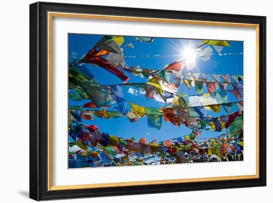 Forest' of Prayer Flags Backlit Against the Sun at the Top of Khardung La Pass (5,606M) North of…-null-Framed Photographic Print