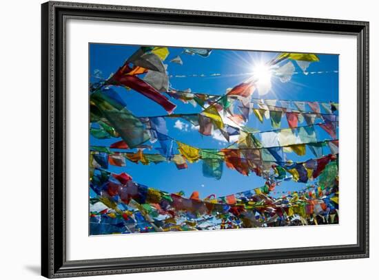 Forest' of Prayer Flags Backlit Against the Sun at the Top of Khardung La Pass (5,606M) North of…-null-Framed Photographic Print