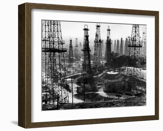 Forest of Wells, Rigs and Derricks Crowd the Signal Hill Oil Fields-Andreas Feininger-Framed Photographic Print