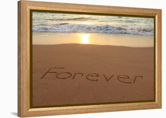 Forever Written in the Sand on a Beach at Sunset.-Hannamariah-Framed Premier Image Canvas