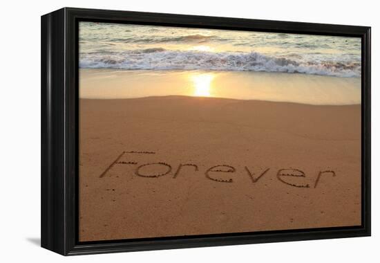 Forever Written in the Sand on a Beach at Sunset.-Hannamariah-Framed Premier Image Canvas