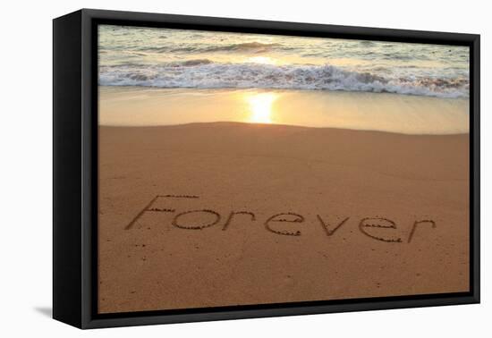 Forever Written in the Sand on a Beach at Sunset.-Hannamariah-Framed Premier Image Canvas