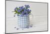 Forget-me-not flowers in milk jug, close up, still life-Andrea Haase-Mounted Photographic Print