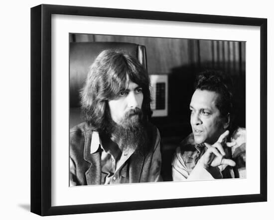 Former Beatle George Harrison (Left) and Indian Musician Ravi Shankar Talk to Newsmen in New York-null-Framed Photo