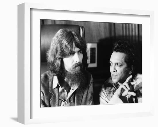 Former Beatle George Harrison (Left) and Indian Musician Ravi Shankar Talk to Newsmen in New York-null-Framed Photo