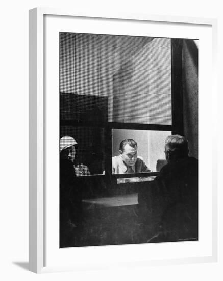 Former German Reichsmarshal Hermann Wilhelm Goering Conferring with Lawyer During Nuremberg Trials-Ralph Morse-Framed Premium Photographic Print