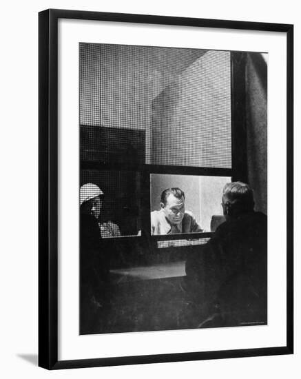 Former German Reichsmarshal Hermann Wilhelm Goering Conferring with Lawyer During Nuremberg Trials-Ralph Morse-Framed Premium Photographic Print