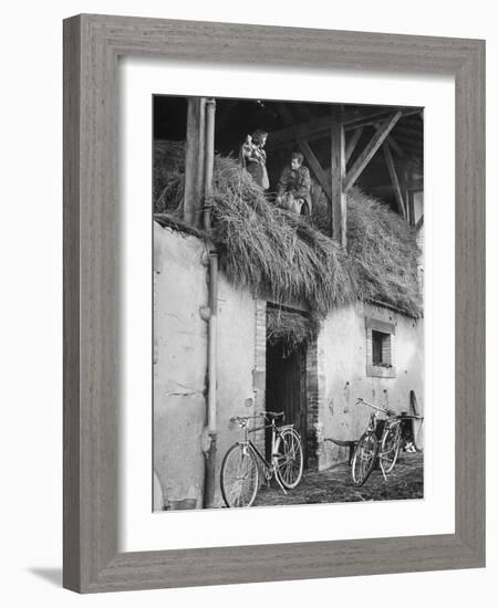 Former GI Ernest Kreiling Showing His Bride the Hayloft Where He Spent Thanksgiving 1944-null-Framed Photographic Print