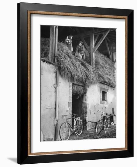 Former GI Ernest Kreiling Showing His Bride the Hayloft Where He Spent Thanksgiving 1944-null-Framed Photographic Print