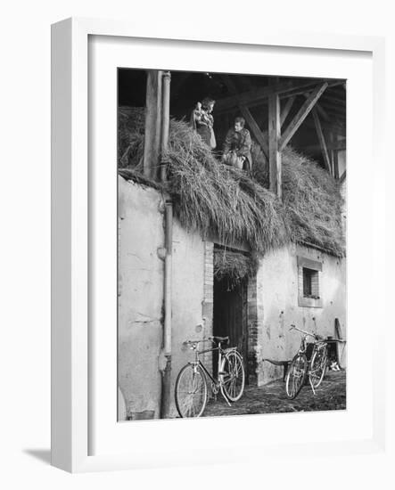 Former GI Ernest Kreiling Showing His Bride the Hayloft Where He Spent Thanksgiving 1944-null-Framed Photographic Print