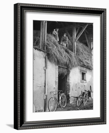 Former GI Ernest Kreiling Showing His Bride the Hayloft Where He Spent Thanksgiving 1944-null-Framed Photographic Print