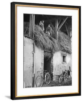 Former GI Ernest Kreiling Showing His Bride the Hayloft Where He Spent Thanksgiving 1944-null-Framed Photographic Print
