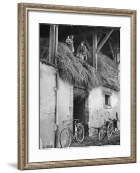 Former GI Ernest Kreiling Showing His Bride the Hayloft Where He Spent Thanksgiving 1944-null-Framed Photographic Print