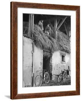 Former GI Ernest Kreiling Showing His Bride the Hayloft Where He Spent Thanksgiving 1944-null-Framed Photographic Print