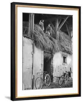 Former GI Ernest Kreiling Showing His Bride the Hayloft Where He Spent Thanksgiving 1944-null-Framed Photographic Print