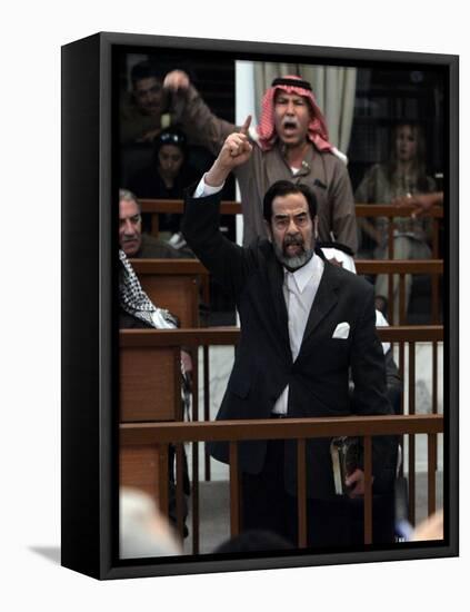 Former Iraqi President Saddam Hussein Berates the Court During their Trial in Baghdad-null-Framed Premier Image Canvas