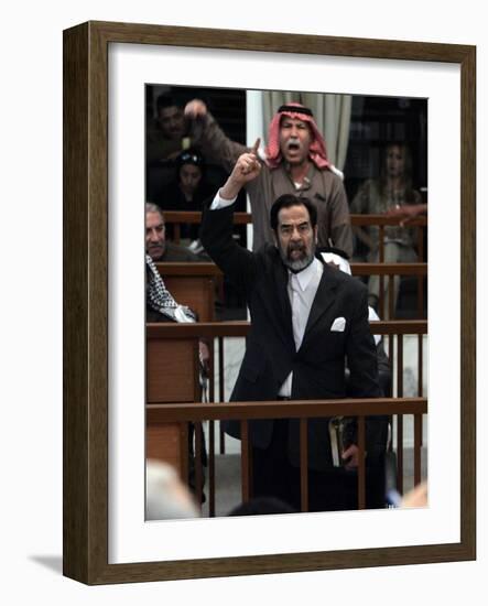 Former Iraqi President Saddam Hussein Berates the Court During their Trial in Baghdad-null-Framed Photographic Print