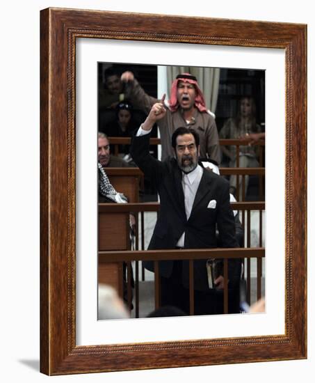 Former Iraqi President Saddam Hussein Berates the Court During their Trial in Baghdad-null-Framed Photographic Print