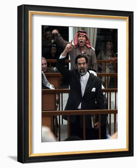 Former Iraqi President Saddam Hussein Berates the Court During their Trial in Baghdad-null-Framed Photographic Print