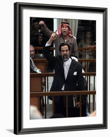 Former Iraqi President Saddam Hussein Berates the Court During their Trial in Baghdad-null-Framed Photographic Print