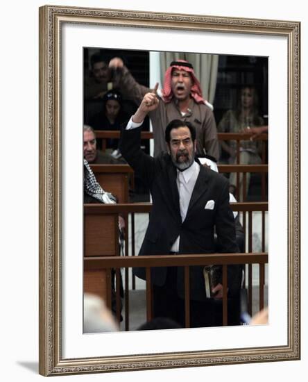 Former Iraqi President Saddam Hussein Berates the Court During their Trial in Baghdad-null-Framed Photographic Print