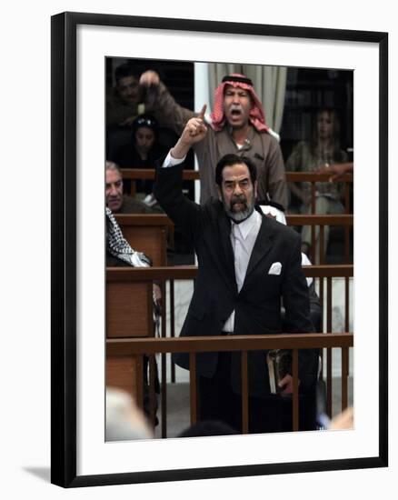 Former Iraqi President Saddam Hussein Berates the Court During their Trial in Baghdad-null-Framed Photographic Print