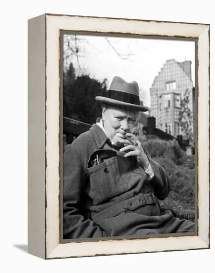 Former Pm Winston Churchill Resting on Bench, Puffing on Cigar, Outside Country Estate Chartwell-Hans Wild-Framed Premier Image Canvas