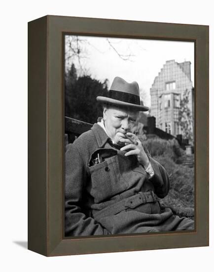 Former Pm Winston Churchill Resting on Bench, Puffing on Cigar, Outside Country Estate Chartwell-Hans Wild-Framed Premier Image Canvas