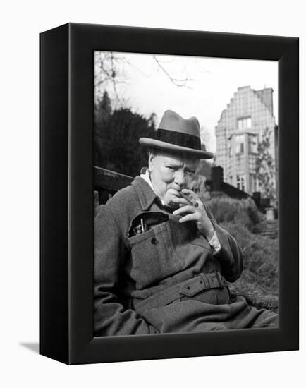 Former Pm Winston Churchill Resting on Bench, Puffing on Cigar, Outside Country Estate Chartwell-Hans Wild-Framed Premier Image Canvas