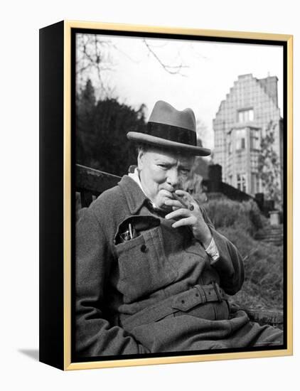 Former Pm Winston Churchill Resting on Bench, Puffing on Cigar, Outside Country Estate Chartwell-Hans Wild-Framed Premier Image Canvas