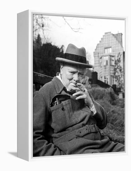 Former Pm Winston Churchill Resting on Bench, Puffing on Cigar, Outside Country Estate Chartwell-Hans Wild-Framed Premier Image Canvas