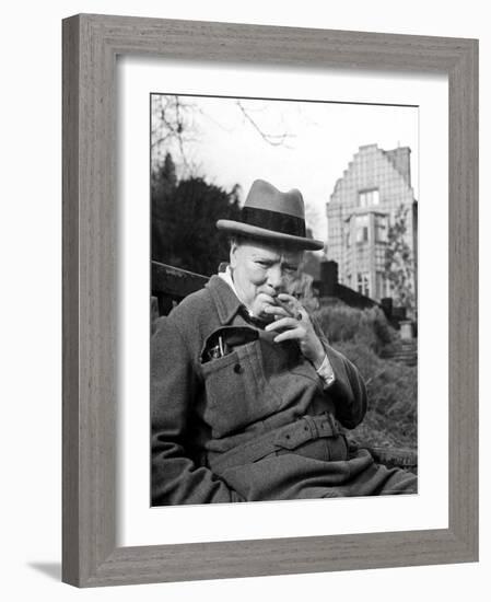 Former Pm Winston Churchill Resting on Bench, Puffing on Cigar, Outside Country Estate Chartwell-Hans Wild-Framed Premium Photographic Print