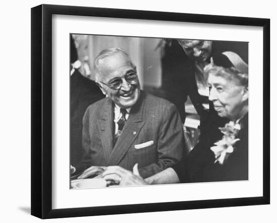 Former President Harry S. Truman Talking with Mrs. Franklin D. Roosevelt-null-Framed Photographic Print