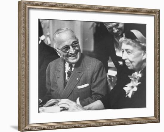 Former President Harry S. Truman Talking with Mrs. Franklin D. Roosevelt-null-Framed Photographic Print